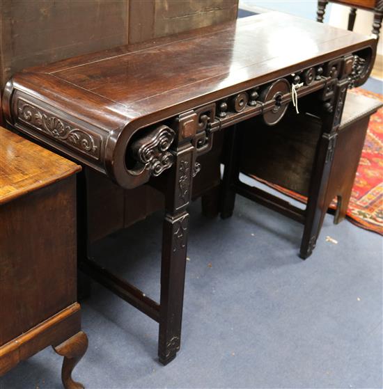 A Chinese carved hardwood altar table W.124cm